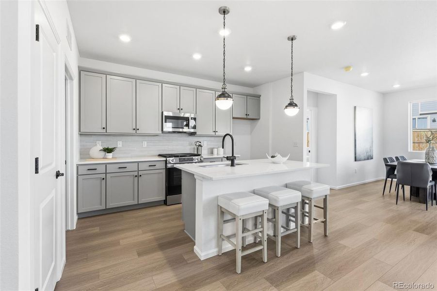 Furnished interior view inside a new home in The Cottages Collection at Ridgeline Vista, Brighton (Image 6).