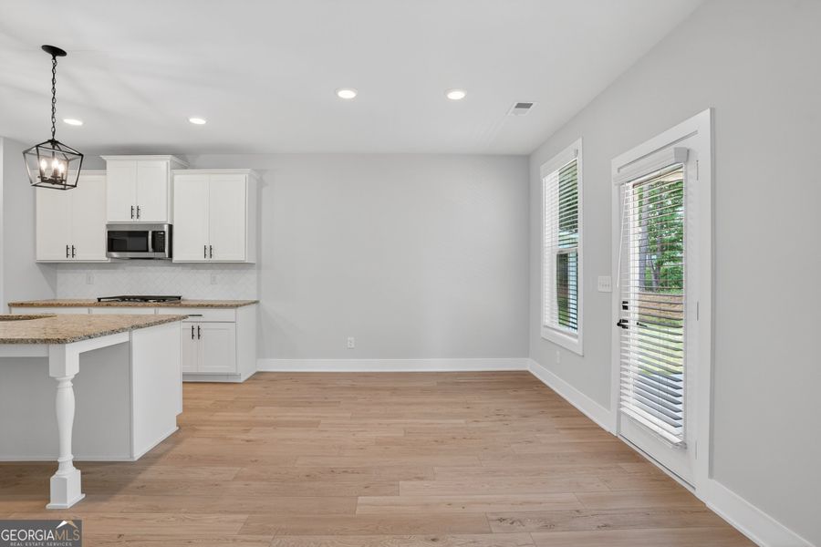 Spacious, unfurnished interior of a new home in The Fairways at Mirror Lake, Villa Rica (Image 18). Spacious, unfurnished interior of a new home in The Fairways at Mirror Lake, Villa Rica (Image 18).