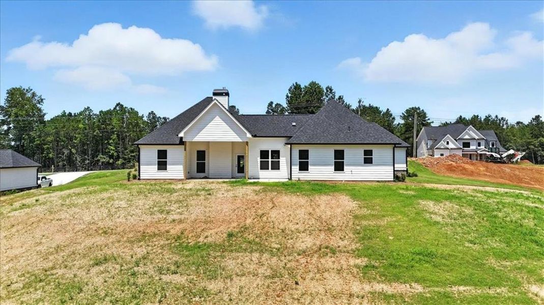Front exterior of a new home in , Waleska, GA, highlighting curb appeal (Image 23).