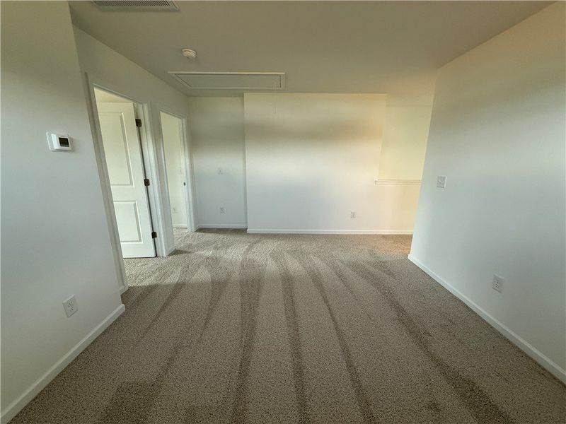 A well-maintained upstairs landing provides access A well-maintained upstairs landing provides access