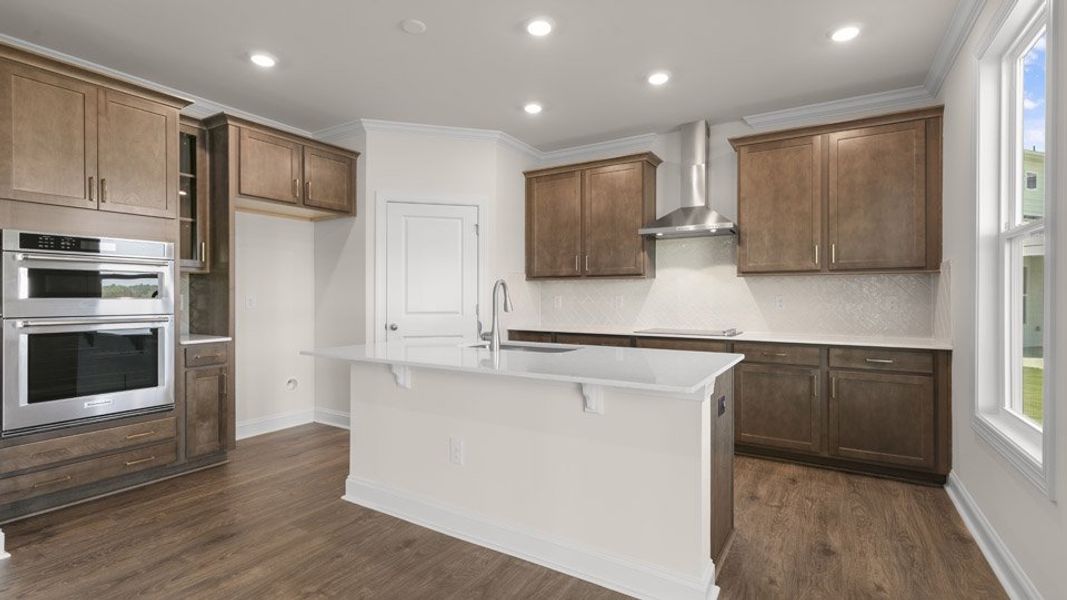 Representative furnished interior of a home built from the EDISTO by D.R. Horton in Eagle Creek, Fuquay Varina (Image 4).