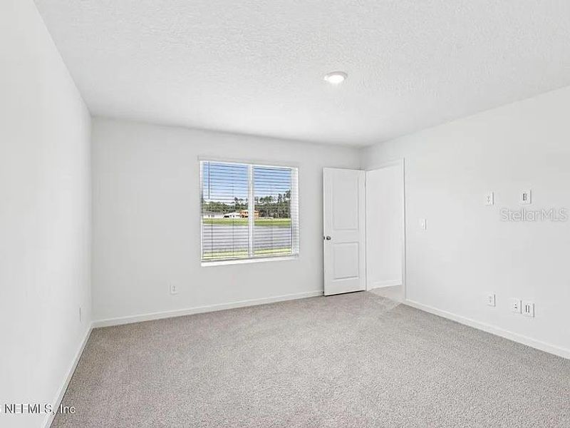 Spacious, unfurnished interior of a new home in Colbert Landings, Palm Coast (Image 19). Spacious, unfurnished interior of a new home in Colbert Landings, Palm Coast (Image 19).