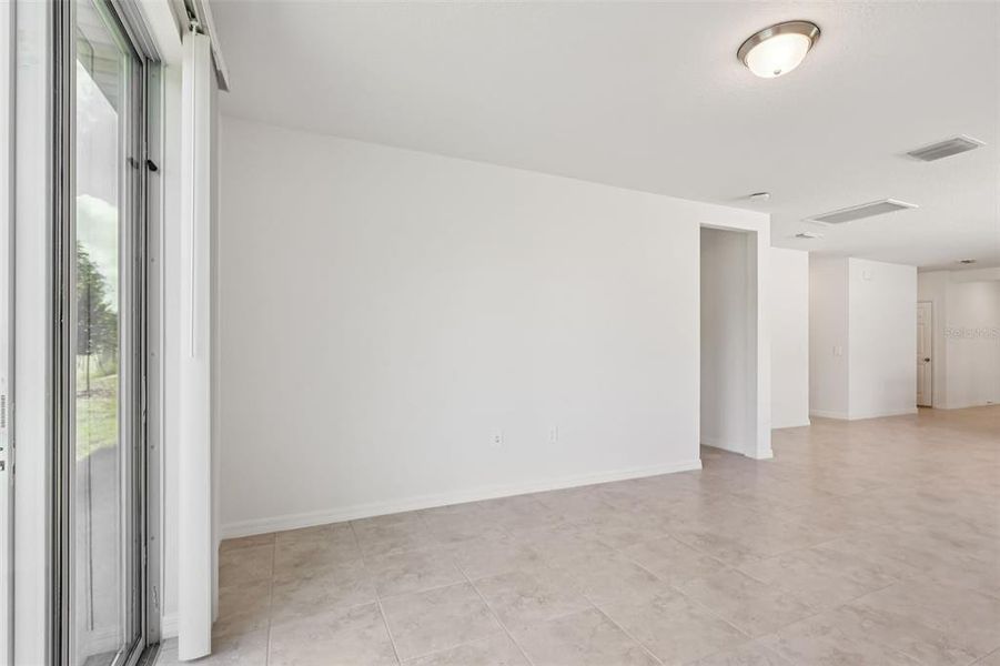 Spacious, unfurnished interior of a new home in Bradbury Creek - Signature Series, Haines City (Image 33).