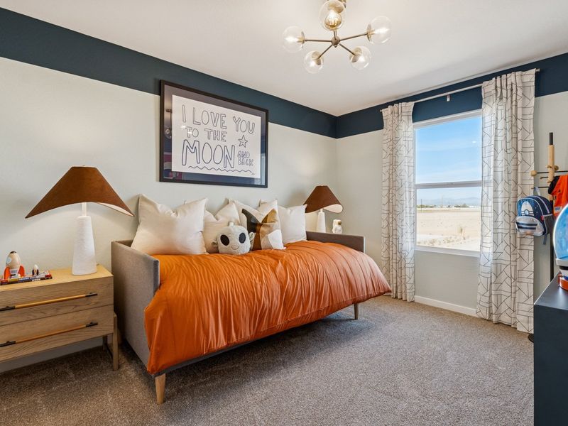 A bedroom with a large bed. A bedroom with a large bed.