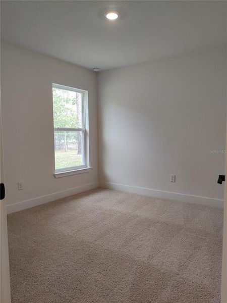 Spacious, unfurnished interior of a new home in Royal Highlands, Weeki Wachee (Image 13).