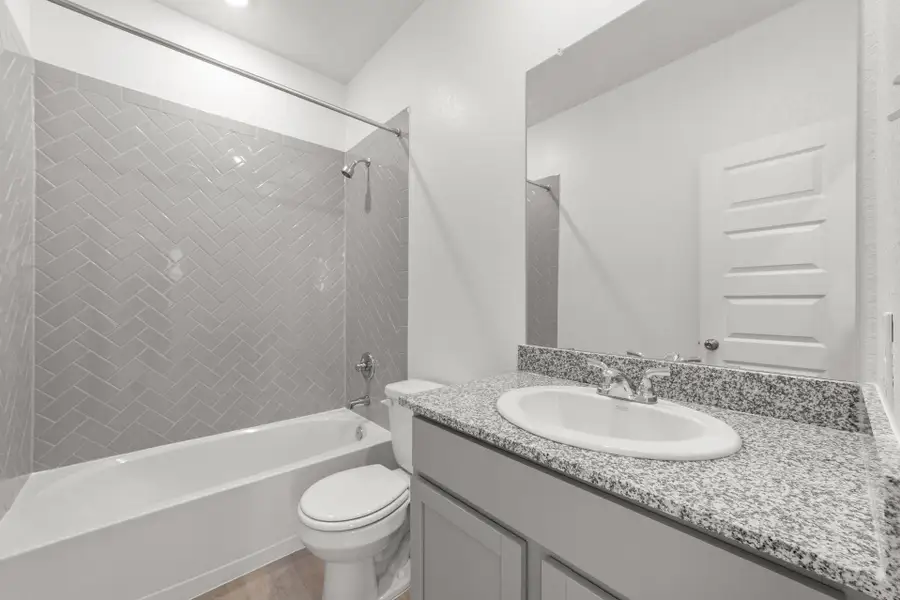 Furnished interior view inside a new home in Villas Las Flores, Floresville (Image 13).