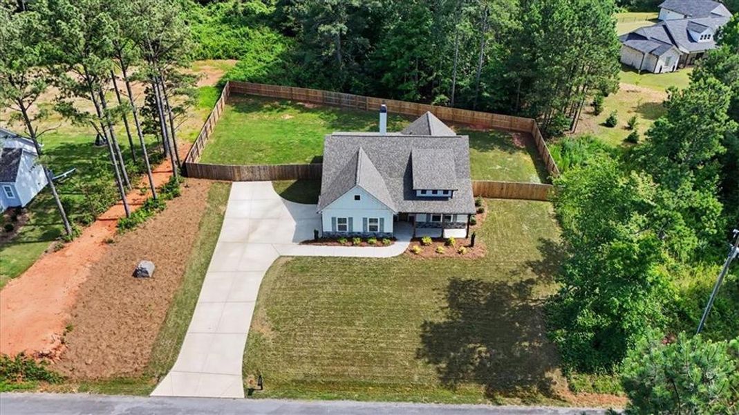 Front exterior of a new home in , Dallas, GA, highlighting curb appeal (Image 23).