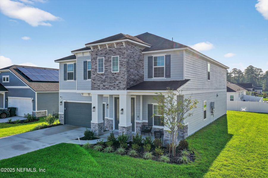 Front exterior of a new home in , Middleburg, FL, highlighting curb appeal (Image 30).