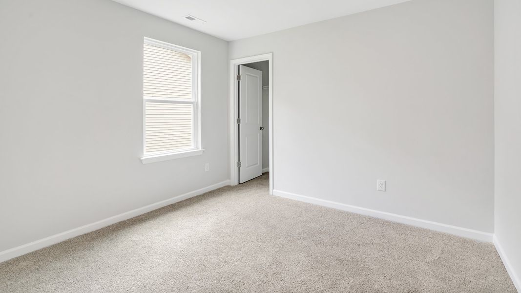 Spacious, unfurnished interior of a new home in Saltgrass Landing, Winnabow (Image 29).