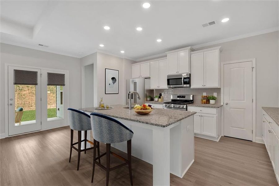 Furnished interior view inside a new home in Heritage Pointe at The Georgian, Villa Rica (Image 8).