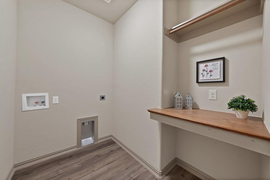 Large laundry room with folding table or desk Large laundry room with folding table or desk