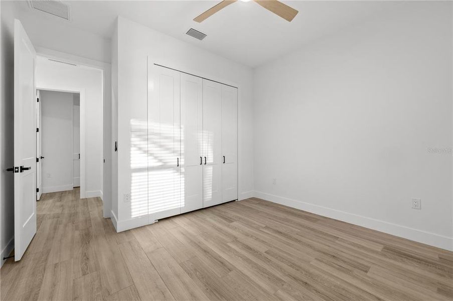 Spacious, unfurnished interior of a new home in , Port Charlotte (Image 26).