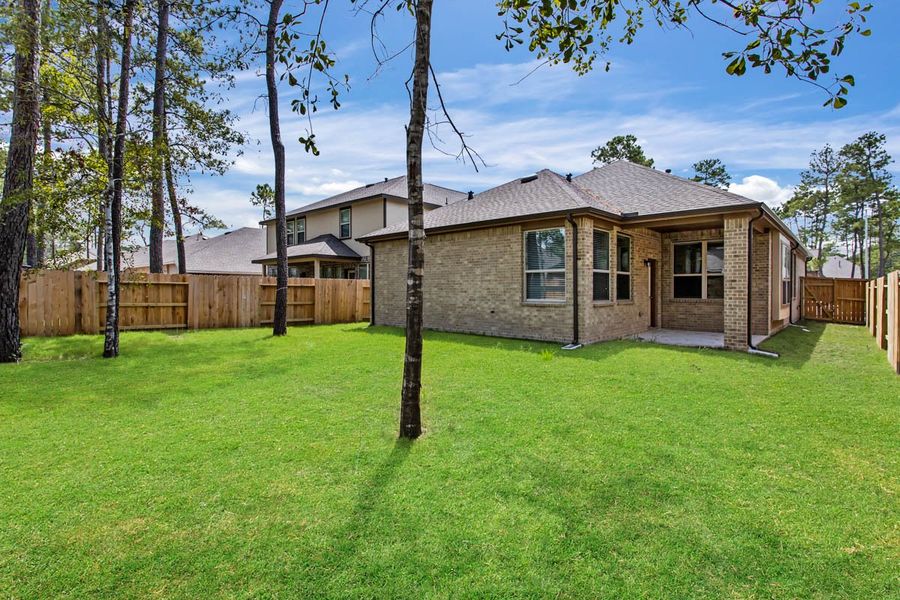 Representative exterior photo of a completed home built from the Rowen by Chesmar Homes in The Woodlands Hills, Willis, TX (Image 9). Representative exterior photo of a completed home built from the Rowen by Chesmar Homes in The Woodlands Hills, Willis, TX (Image 9).