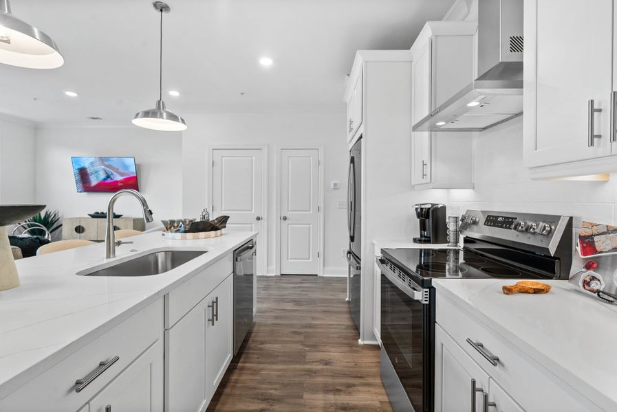 Representative furnished interior of a home built from the The Magnolia by The Providence Group in Market Square at Sawnee Village, Cumming (Image 24).
