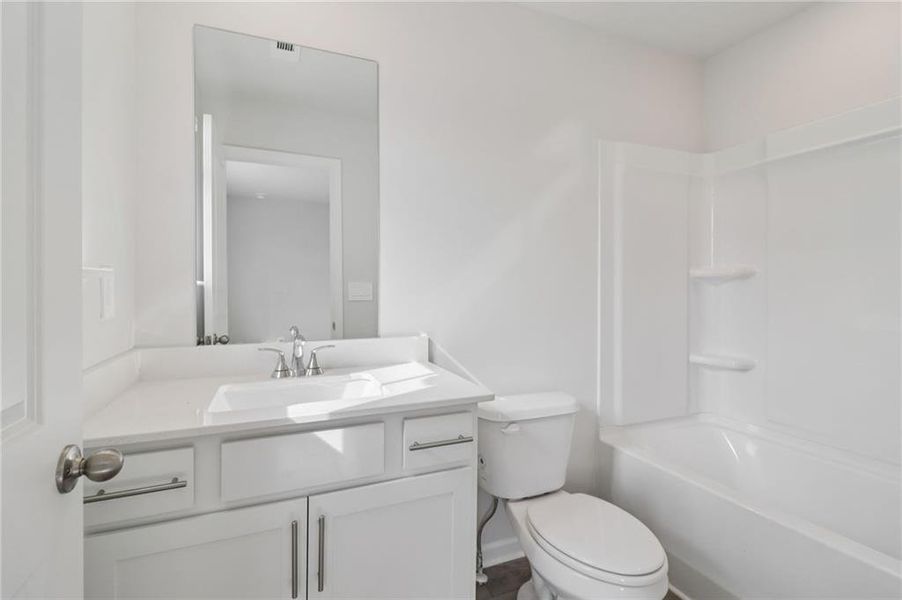 Furnished interior view inside a new home in Harmony Manor, Fairburn (Image 12).