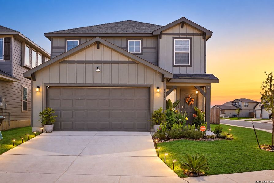 Front exterior of a new home in Red Hawk Landing, San Antonio, TX, highlighting curb appeal (Image 2). Front exterior of a new home in Red Hawk Landing, San Antonio, TX, highlighting curb appeal (Image 2).