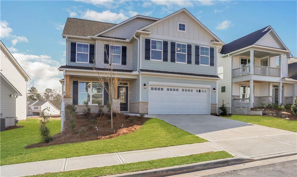 Front exterior of a new home in Twin Lakes, Hoschton, GA, highlighting curb appeal (Image 26).