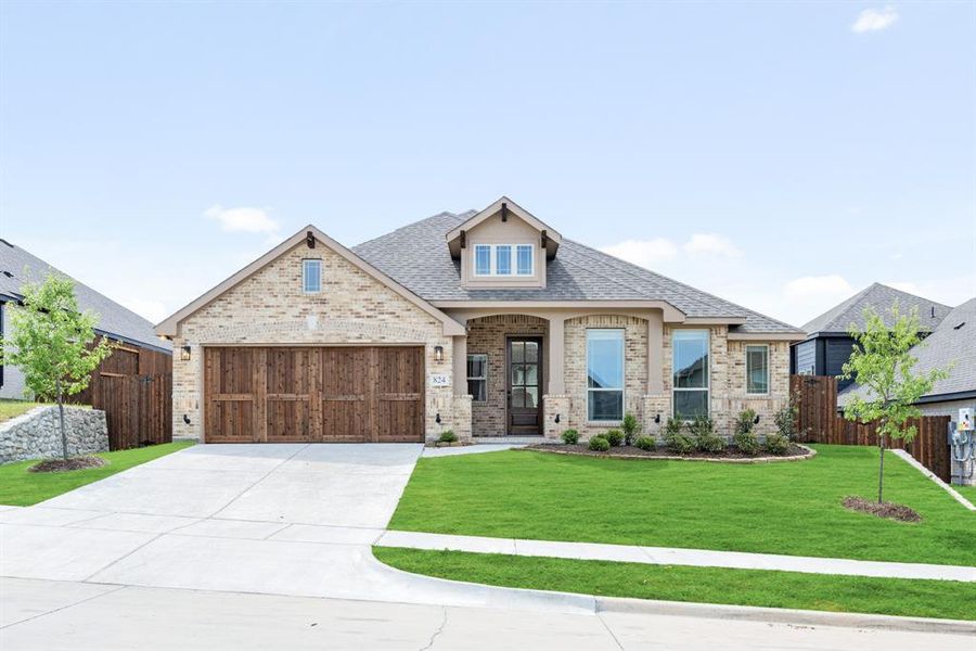 Front exterior of a new home in Homestead at Daniel Farms, DeSoto, TX, highlighting curb appeal (Image 2).