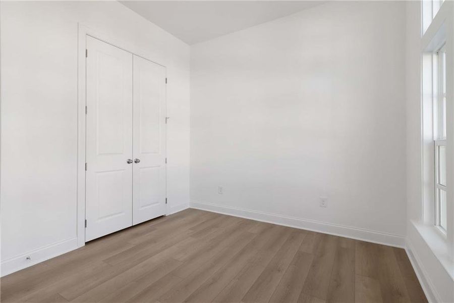 Spacious, unfurnished interior of a new home in East Harbor II at Chestatee, Dawsonville (Image 66).