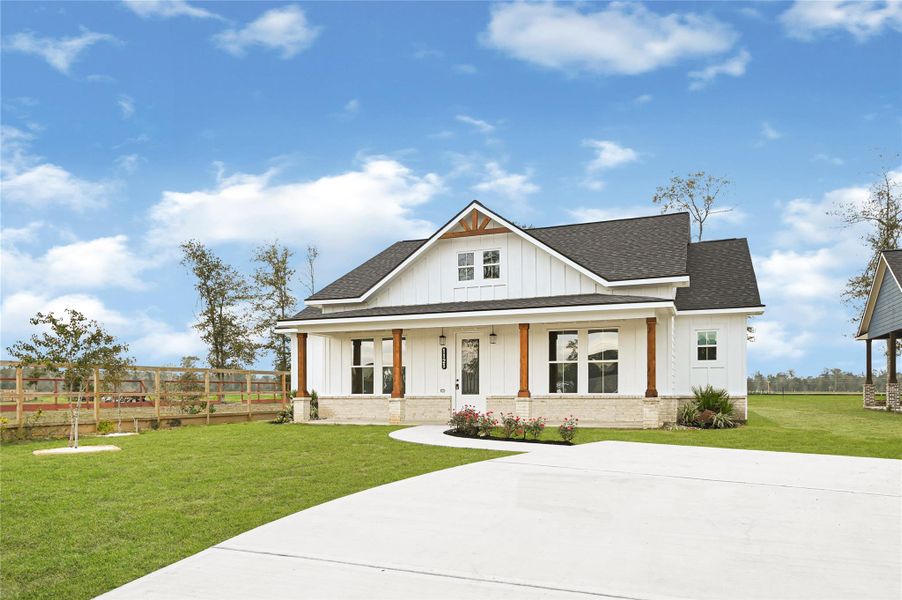 Front exterior of a new home in , Huffman, TX, highlighting curb appeal (Image 21). Front exterior of a new home in , Huffman, TX, highlighting curb appeal (Image 21).