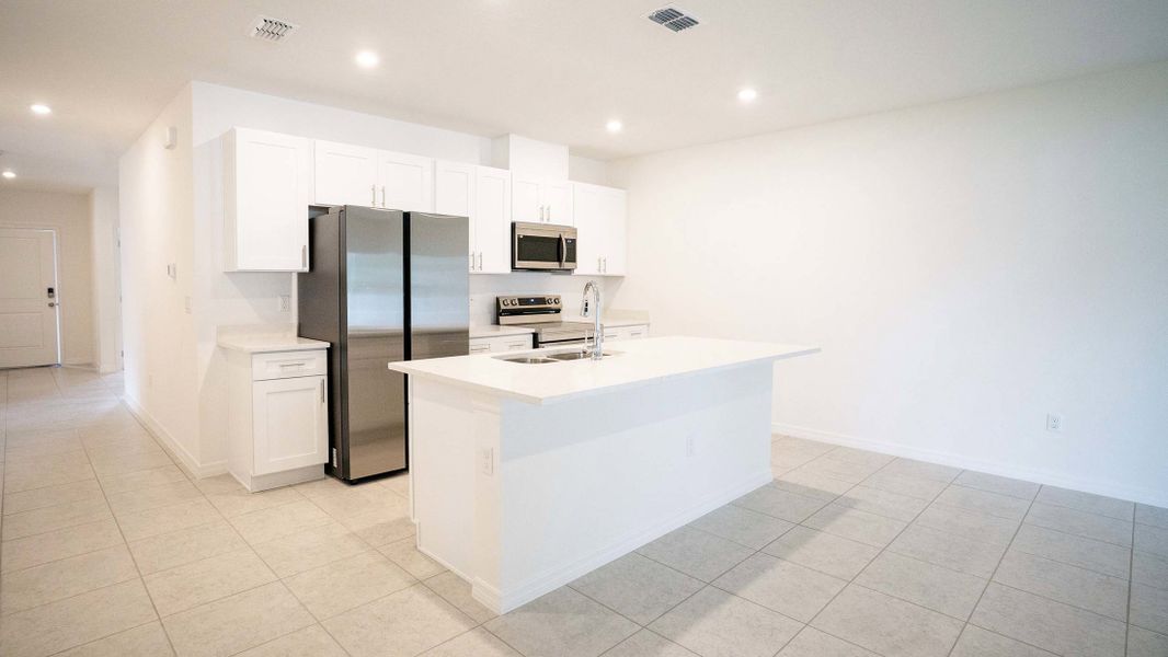 Representative furnished interior of a home built from the Magnolia by Maronda Homes in Vero Lake Estates, Sebastian (Image 4).