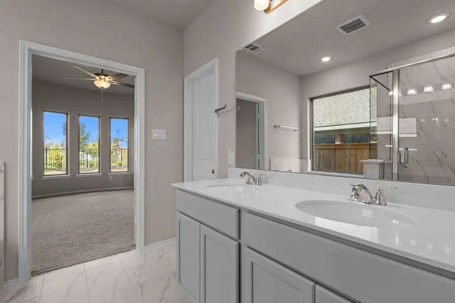 Furnished interior view inside a new home in Bridgeland, Cypress (Image 9).