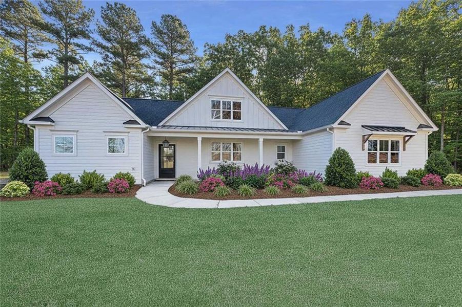 Front exterior of a new home in , Ball Ground, GA, highlighting curb appeal (Image 2).