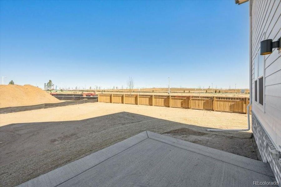 Exterior details and patio area of a home in The Haven Collection at Windler, Aurora (Image 14). Exterior details and patio area of a home in The Haven Collection at Windler, Aurora (Image 14).