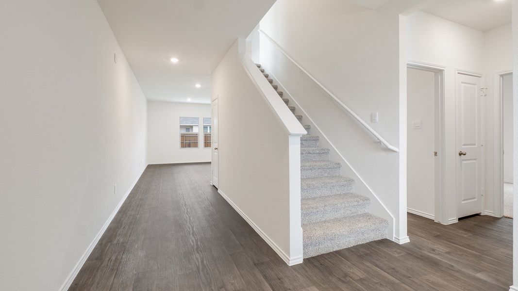 Representative unfurnished interior of a home built from the The Nicole by D.R. Horton in Wayside, Uhland (Image 11).