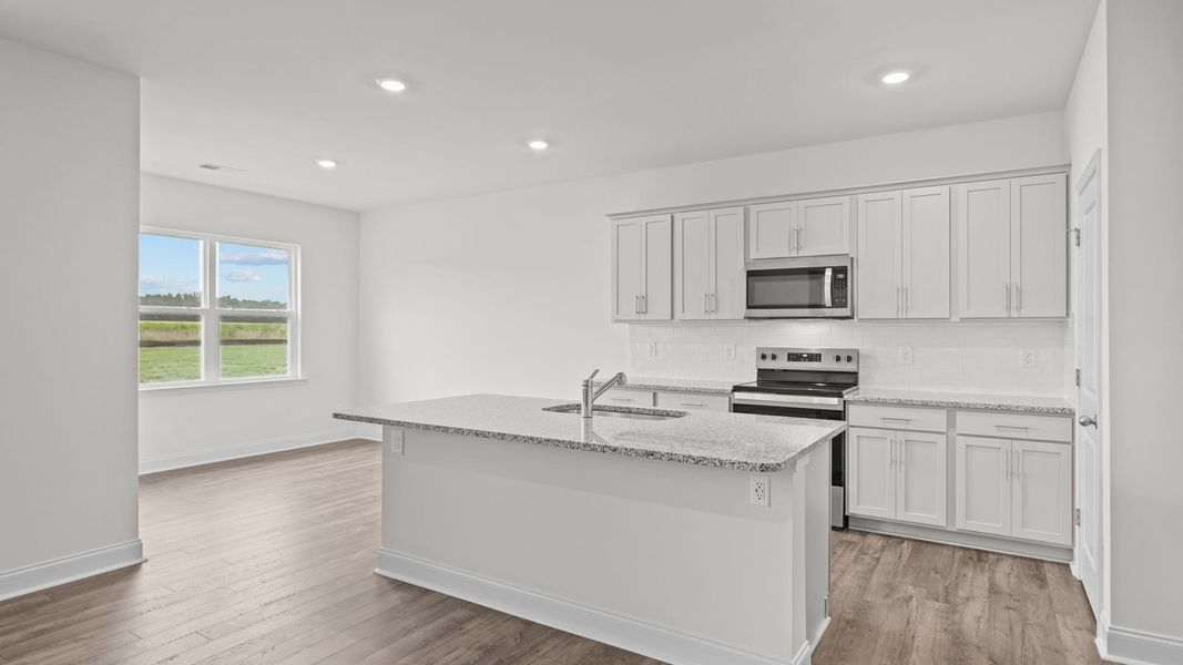 Furnished interior view inside a new home in Dail Farm, Farmville (Image 5).