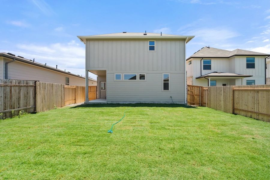 Front exterior of a new home in Crosswinds, Kyle, TX, highlighting curb appeal (Image 40). Front exterior of a new home in Crosswinds, Kyle, TX, highlighting curb appeal (Image 40).