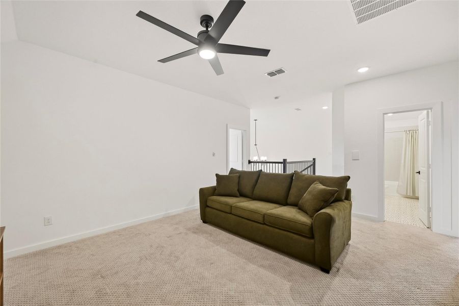 This flexible game room offers plenty of possibilities for movie nights, game-day fun or a comfortable space to relax and enjoy time at home. This flexible game room offers plenty of possibilities for movie nights, game-day fun or a comfortable space to relax and enjoy time at home.
