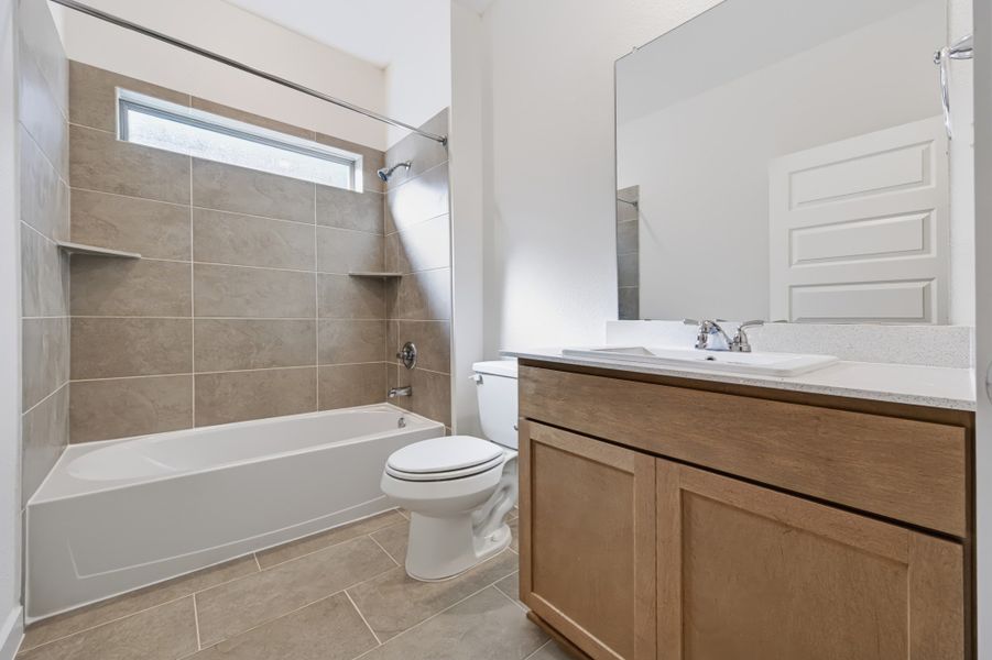 Furnished interior view inside a new home in Prairie Winds, Hutto (Image 14).