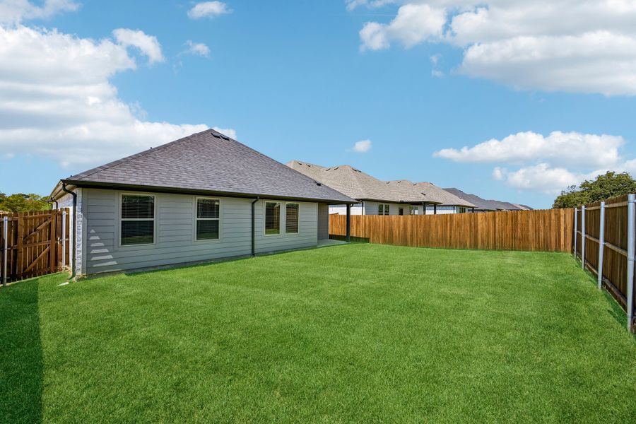 Covered Patio in the Harrison home plan by Trophy Signature Homes
