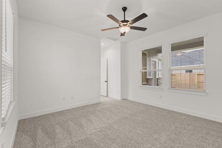 Representative unfurnished interior of a home built from the Sorenstam by Chesmar Homes in Riceland Alley Loads, Mont Belvieu (Image 73).