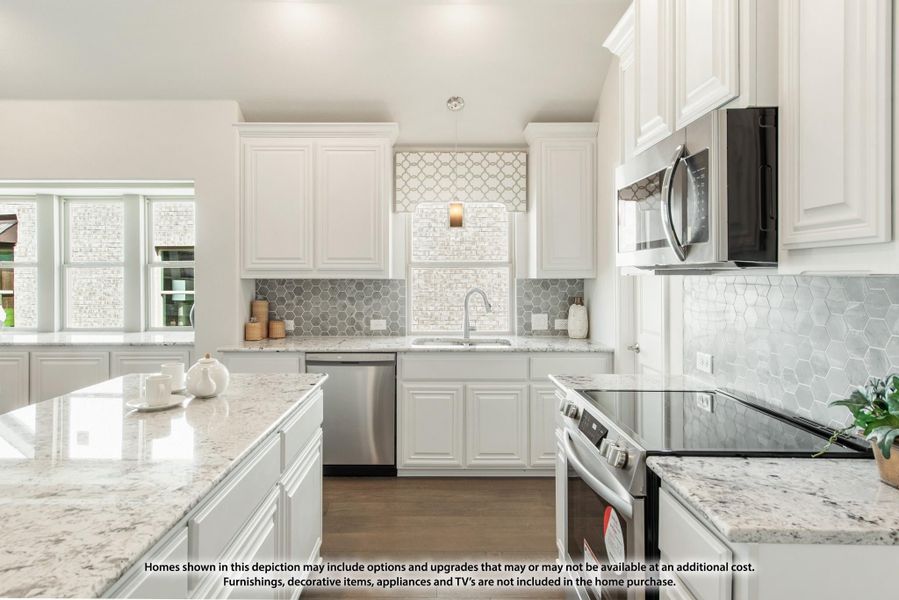 Kitchen with white cabinets, granite countertops, hexagon tile backsplash, and stainless steel appliances Kitchen with white cabinets, granite countertops, hexagon tile backsplash, and stainless steel appliances