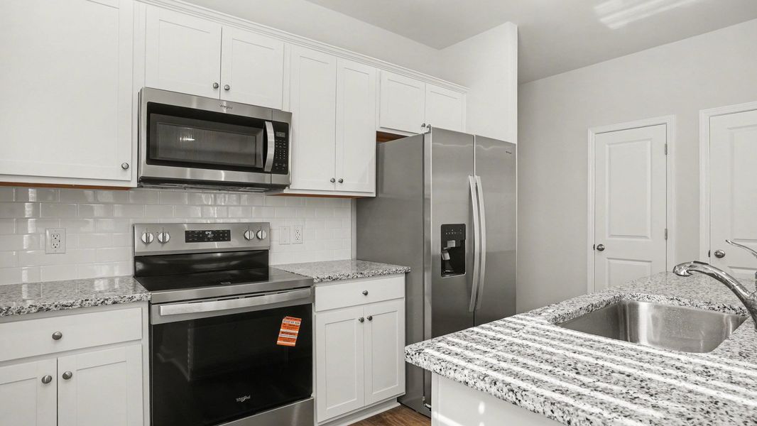 Furnished interior view inside a new home in Pinewood Estates, Conway (Image 4).