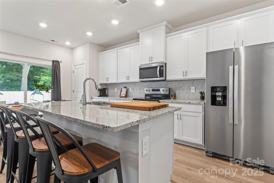 Furnished interior view inside a new home in Henderson Manor, Charlotte (Image 3).