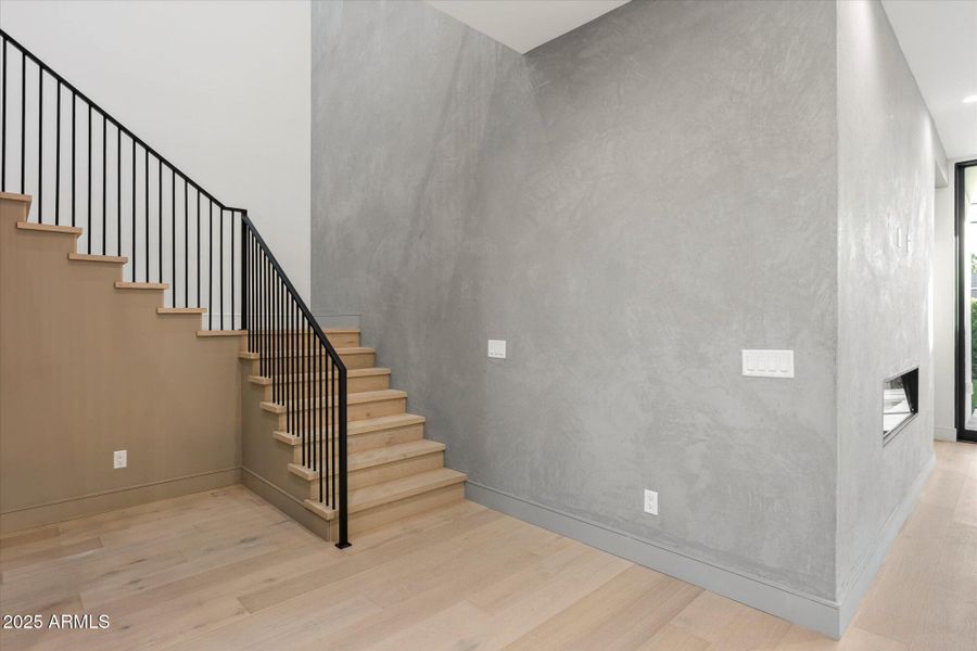 Stairway with custom plaster wall detail