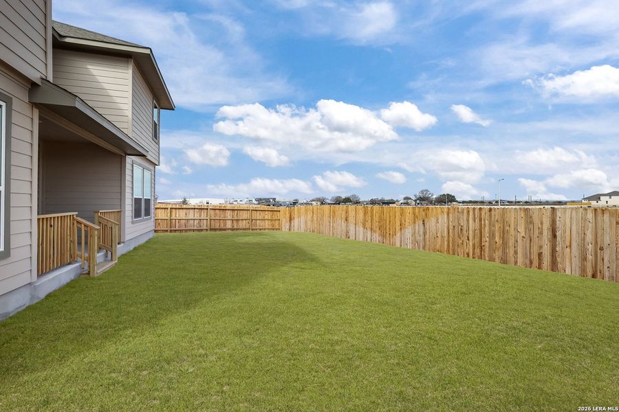 Exterior details and patio area of a home in Megan's Landing, Castroville (Image 4).