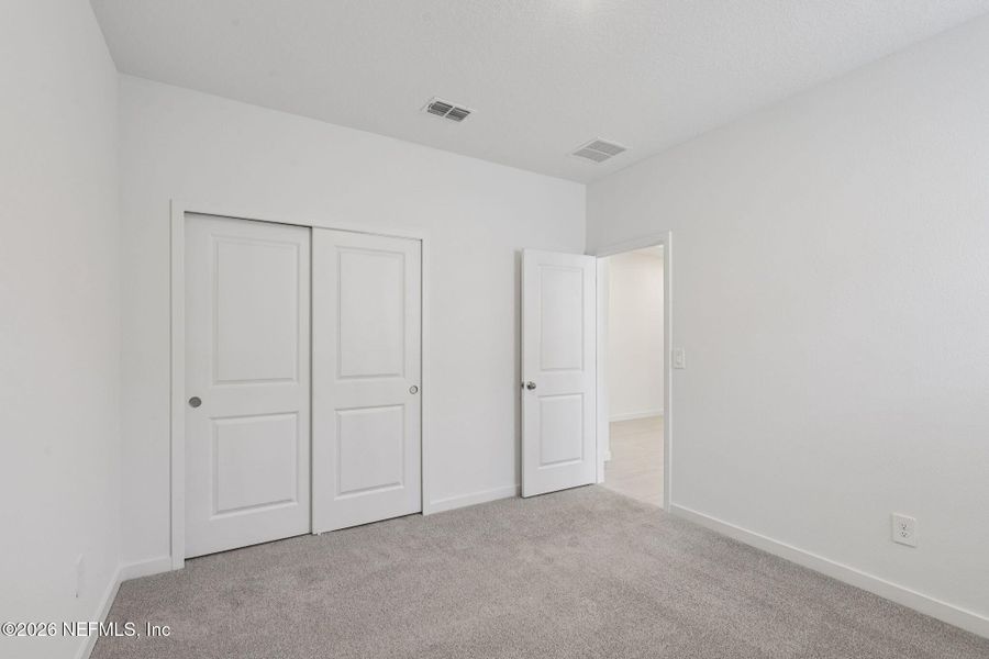 Spacious, unfurnished interior of a new home in Cypress Meadows - Signature Series, Jacksonville (Image 24).