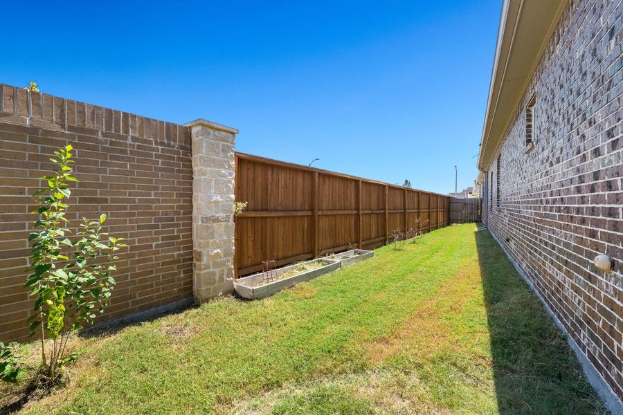 Front exterior of a new home in , Tomball, TX, highlighting curb appeal (Image 21).