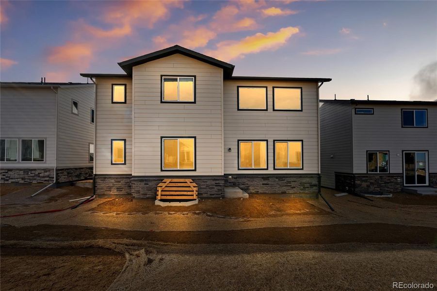 Exterior details and patio area of a home in Harvest Crossing, Aurora (Image 2).