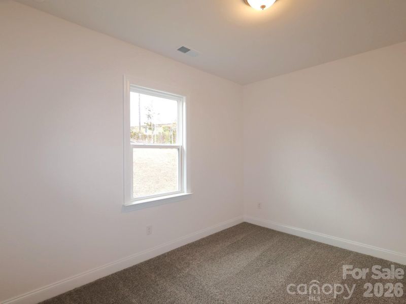 Main level guest room Main level guest room