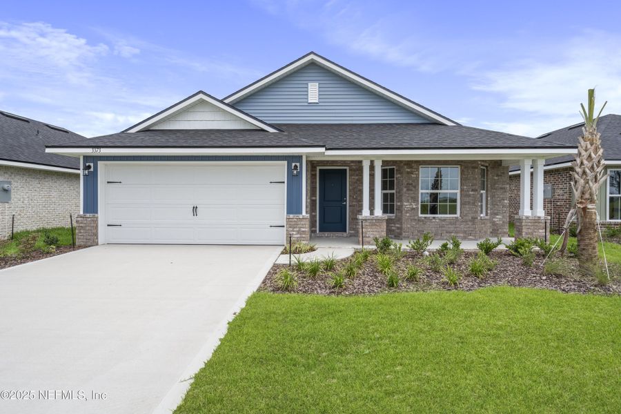 Front exterior of a new home in Shadow Crest at Rolling Hills, Green Cove Springs, FL, highlighting curb appeal (Image 1).