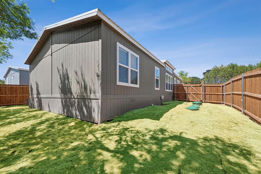 Exterior details and patio area of a home in , Granbury (Image 22).