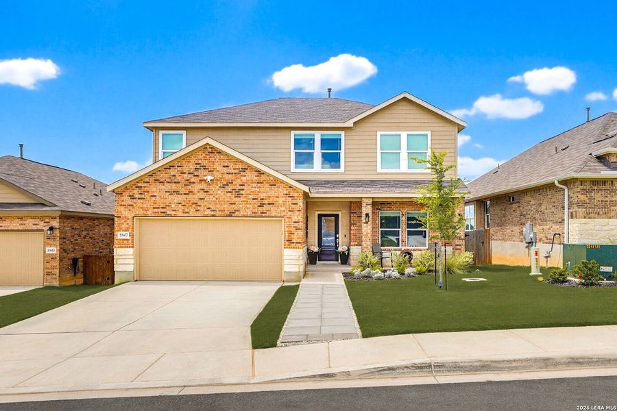 Front exterior of a new home in Hidden Trails, Bulverde, TX, highlighting curb appeal (Image 2). Front exterior of a new home in Hidden Trails, Bulverde, TX, highlighting curb appeal (Image 2).