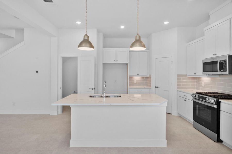 Furnished interior view inside a new home in Bridgeland, Cypress (Image 6).