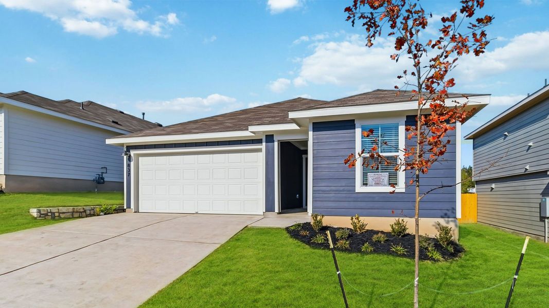 Front exterior of a new home in Wayside, Uhland, TX, highlighting curb appeal (Image 23).