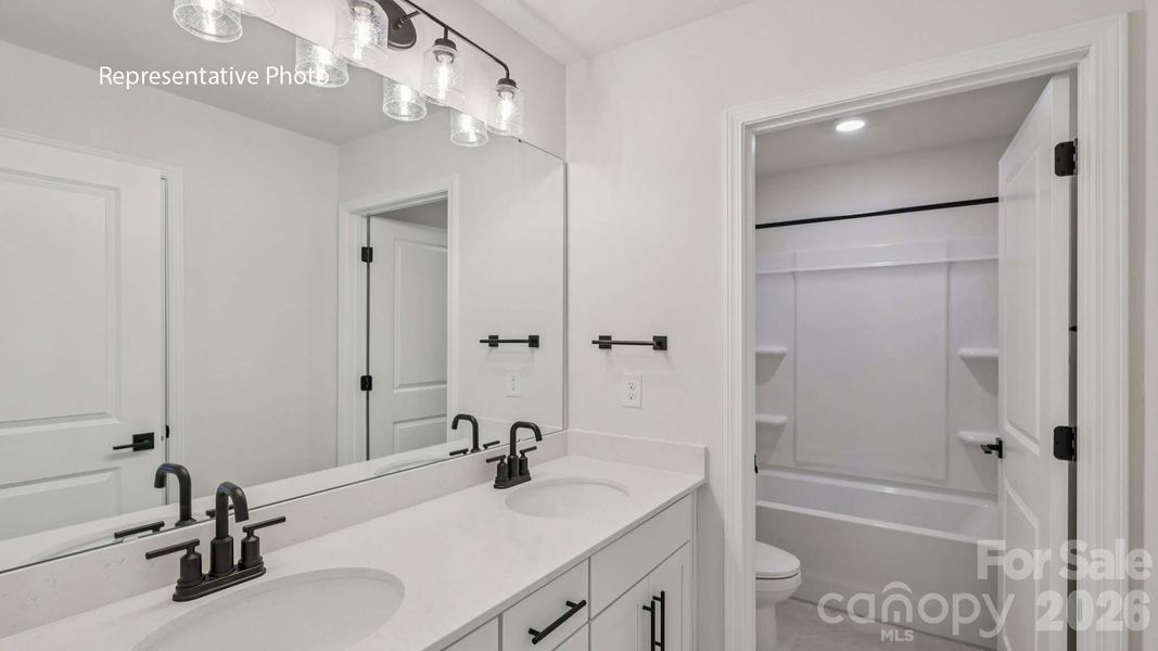 Furnished interior view inside a new home in Sanctuary at Southgate, Indian Trail (Image 3).